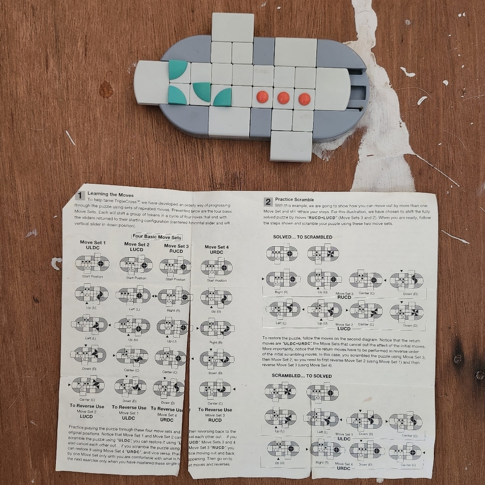 Triple Cross Gray and White Puzzle Game
